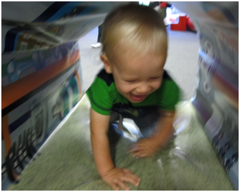 A happy child crawling.
